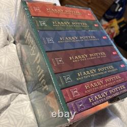 Coffret de livres en format de poche Harry Potter #1-7 J. K. Rowling Scholastic Neuf Dans sa boîte