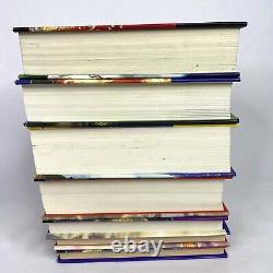 Collection complète de livres Harry Potter 1-7 en version reliée avec couverture rigide et jaquette par J.K. Rowling