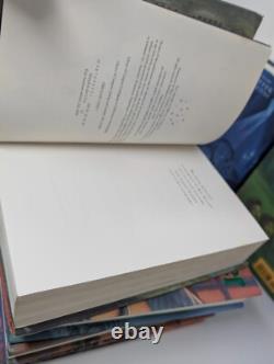 Édition américaine complète en reliure rigide de Harry Potter, livres 1-7, en bon état d'occasion