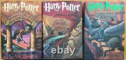 Ensemble COMPLET de 7 Reliures Rigides avec Jaquette de Harry Potter par J K Rowling Première Édition
