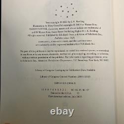 Ensemble complet de livres de Harry Potter en couverture rigide, tomes 1-7 avec quelques reçus et un porte-clé ID.