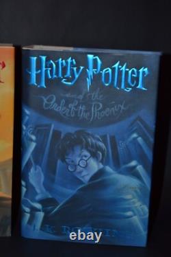 Ensemble complet de livres en couverture rigide Harry Potter 1-7 1ère édition américaine J.K. Rowling