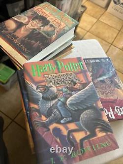 Ensemble complet de livres reliés HARRY POTTER Lot 1-7 par JK Rowling Première édition