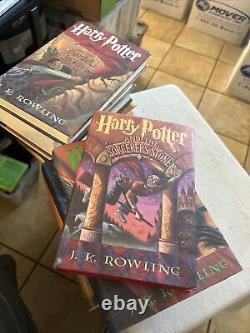 Ensemble complet de livres reliés HARRY POTTER Lot 1-7 par JK Rowling Première édition