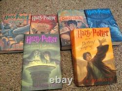 Ensemble complet de livres reliés Harry Potter 1-7 1ère édition américaine J. K. Rowling