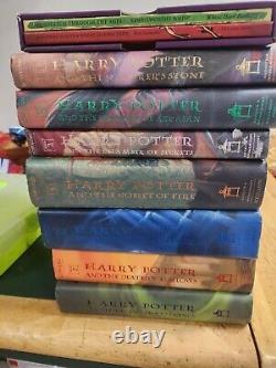 Ensemble complet de livres reliés Harry Potter 1-7 1ère édition américaine J.K. Rowling