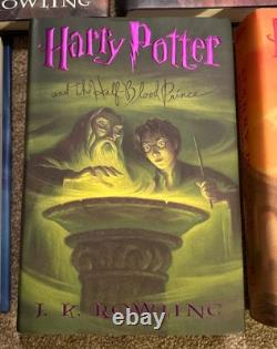 Ensemble complet de livres reliés Harry Potter 1-7 J K Rowling avec jaquettes 1ère édition