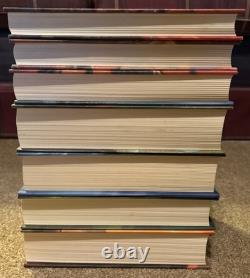 Ensemble complet de livres reliés Harry Potter 1-7 J K Rowling avec jaquettes 1ère édition