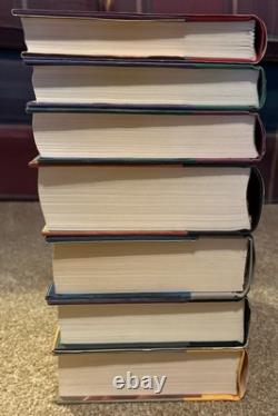 Ensemble complet de livres reliés Harry Potter 1-7 J K Rowling avec jaquettes 1ère édition