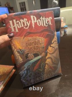 Ensemble complet de livres reliés Harry Potter avec jaquettes 1-7 1ère édition américaine