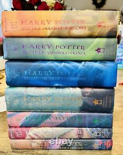 Ensemble complet en reliure de Harry Potter livres 1-7 première édition J. K. Rowling Jaquettes