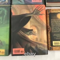 Ensemble de livres Harry Potter en édition reliée, ensemble complet 1-7 et Le Conte des Bardes, J.K. Rowling, en bon état