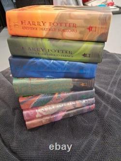 Ensemble de livres reliés de la série complète Harry Potter 1-7, 1ère édition, J.K. Rowling, COMME NEUF