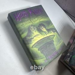 Harry Potter Coffret complet relié livres 1 à 7 première édition J. K. Rowling MAUVAIS