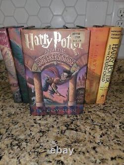 J. K. Rowling, Série HARRY POTTER Collection complète de 7 volumes en édition reliée + livre spécial