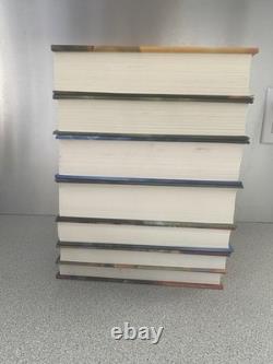 Lot complet Harry Potter 1-7 en reliure rigide avec jaquettes, toutes premières éditions américaines