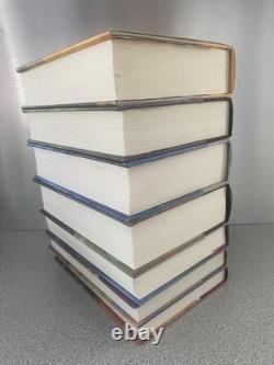 Lot complet Harry Potter 1-7 en reliure rigide avec jaquettes, toutes premières éditions américaines
