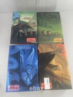 Lot complet Harry Potter 1-7 en reliure rigide avec jaquettes, toutes premières éditions américaines