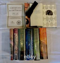Série complète Harry Potter, dont un exemplaire signé, 1re édition américaine, 7 livres au total